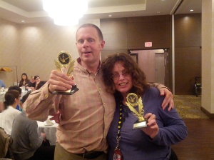 Tom and Margaret proudly display their awards
